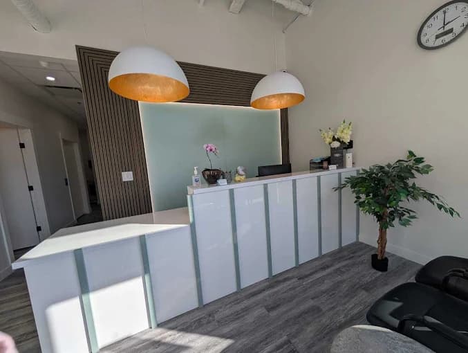 Front reception desk at Rundlehorn Smiles Dental cosmetic dentist in NE Calgary